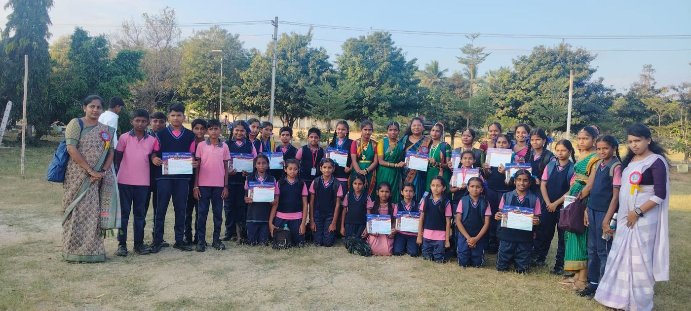 Students holding competition certificates