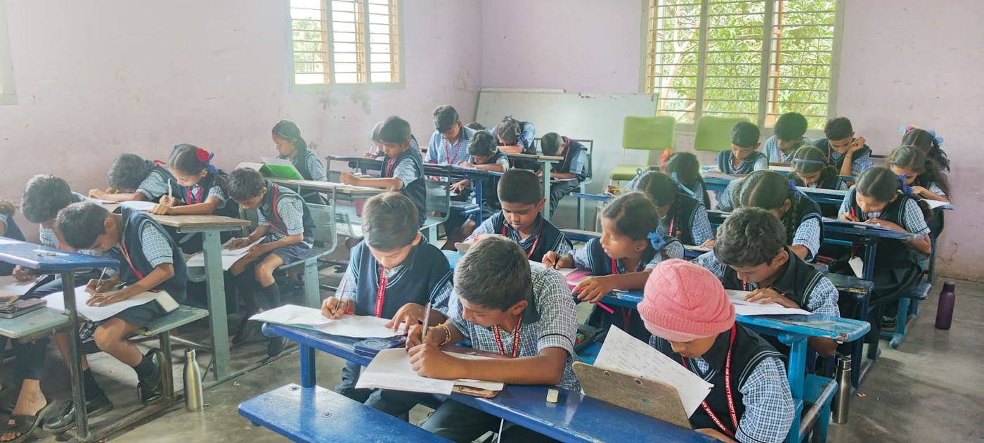 Students writing a test in class